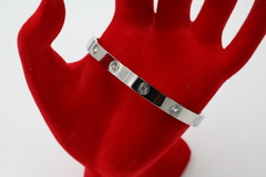 Brazalete tipo Carthier Love con Zirconias en acero inoxidable 316L.