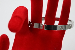 Brazalete tipo Carthier Love con Zirconias en acero inoxidable 316L. - comprar en línea