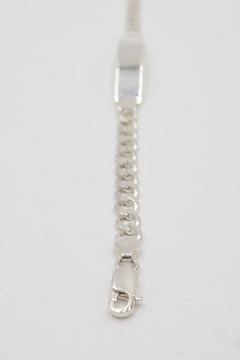 Pulsera barbada con placa en plata .925