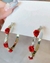 Aretes de aros con detalles rosas - comprar en línea