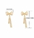 Aretes de moño con detalles en diamantes