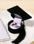 1 estuche en forma de birrete para graduaciones