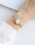 Reloj con Detalles en Metal Color Rosa en internet