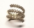 Anel de ouro amarelo 18k com diamantes - espiral