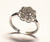 Anel de ouro branco 18k com diamantes - flor