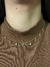 Choker com pingentes crucifixo e pedrinhas com extensor - Banhada a ouro 18k. na internet