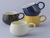 TAZA DE STONEWARE 350ML CON DISENO DE RELIEVE ESRILO PANAL NEGRA APTO PARA MICROONDAS Y LAVAVAJILLAS 9X13CM - Tendence