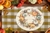 MANTEL INDIVIDUAL REDONDO TIEMPO DE CALABAZA REVERSIBLE PLASTICO FLEXIBLE LIBRE DE BPA MULTICOLOR 34.5 CM. en internet