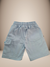 Bermuda infantil masculina azul claro, com cintura elástica e bolsos laterais, sobre fundo de pelúcia branca.
Descubra a Flor do Gato, loja de roupas infantis em Taubaté, Pindamonhangaba, Caçapava e Tremembé, com moda de qualidade e estilo para bebês e cr