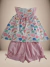 Conjunto infantil da Coleção Pequenos Encantos, com blusa estampada de conchas coloridas e short rosa.

Descubra a Flor do Gato, loja de roupas infantis em Taubaté, Pindamonhangaba e Tremembé, com moda de qualidade e estilo para bebês e crianças.