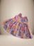 Vestido infantil com estampa de bolinhas coloridas em tons de rosa, azul e amarelo.
Descubra a Flor do Gato, loja de roupas infantis em Taubaté, Pindamonhangaba, Caçapava e Tremembé, com moda de qualidade e estilo para bebês e crianças.