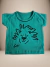 Camisa infantil verde com estampa de leão sorridente, adequada para bebês de 0 a 24 meses.

Descubra a Flor do Gato, loja de roupas infantis em Taubaté, Pindamonhangaba, Caçapava e Tremembé, com moda de qualidade e estilo para bebês e crianças.