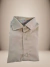 Camisa infantil masculina da linha Pequenos Clássicos, dobrada e com botões, em tom claro.
Descubra a Flor do Gato, loja de roupas infantis em Taubaté, Pindamonhangaba, Caçapava e Tremembé, com moda de qualidade e estilo para bebês e crianças.
