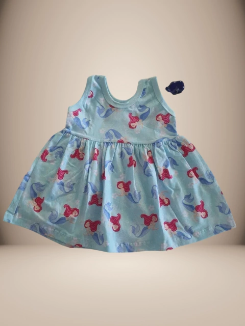 Vestido infantil azul com estampa de sereias, ideal para bebês de 0 a 24 meses.
Descubra a Flor do Gato, loja de roupas infantis em Taubaté, Pindamonhangaba, Caçapava e Tremembé, com moda de qualidade e estilo para bebês e crianças.