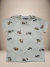 Camisa infantil off white com estampa de animais da savana, incluindo girafas, zebras e leões.

Descubra a Flor do Gato, loja de roupas infantis em Taubaté, Pindamonhangaba, Caçapava e Tremembé, com moda de qualidade e estilo para bebês e crianças.
