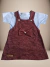 Conjunto jardineira infantil em tom de vinho com laço na frente e camiseta azul por baixo.
Descubra a Flor do Gato, loja de roupas infantis em Taubaté, Pindamonhangaba, Caçapava e Tremembé, com moda de qualidade e estilo para bebês e crianças.