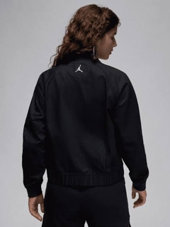 JORDAN VARSITY BOMBER BLACK en internet