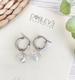 Aros de acero quirúrgico con flores de cristal