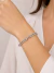 Bracelete Feminino Rígido Prateado com Zircônias e Detalhe Central em H | Semijoia Elegante. - comprar online