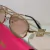 GAFAS MIU MIU LOGO GOLD - comprar online