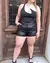 top de lycra irregular con cadena dorada