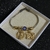 Pulseira Com Signos Banhada a Ouro Negro 18k Semi Joias - comprar online