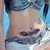 Tatuaje temporal de Flores y plumas de Pavo Real en internet
