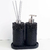 Essenza Volcano Lavatory Kit featuring two black textured containers with a soap dispenser and reed diffuser.