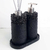 Essenza Volcano Lavatory Kit featuring a black soap dispenser and a diffuser on a matching base.