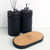 Essenza Volcano Lavatory Kit featuring two black decorative containers and a cork tray.