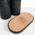 Essenza Volcano Lavatory Kit featuring black textured holders and a cork base.