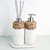 Kit lavabo Atenas com dispenser e difusor de aroma em design elegante, composto por materiais naturais e texturas sofisticadas.