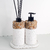 Kit lavabo Atenas com dispensador e difusor em base de pedras naturais e suporte branco.