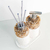 Kit lavabo Atenas com dispenser e difusor de ambiente, decorado com pedras naturais, ideal para banheiros e lavabos.