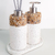 Kit lavabo Atenas com dispenser e difusor de aromas, acabamento em pedras naturais e base branca.
