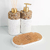 Kit lavabo elegante com decoração em pedras naturais e base de cortiça, ideal para banheiros e lavabos.
