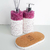 Conjunto de itens de lavabo Malaya com frascos decorativos e base de cortiça.