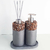 Kit de Aseo Pekín que incluye dispensador de jabón y difusor de aromas, con base de concreto y detalles de piedras decorativas.