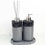 Kit Lavabo Tóquio com dispenser e difusor em tons de cinza e detalhes em preto.