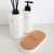 Kit lavabo Santorini com frascos decorativos e suporte de cortiça.