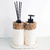 Kit Lavabo Duna com frascos decorativos em tons neutros e detalhes em pedras naturais.