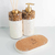 Kit lavabo Duna com dispensador e difusor, adornados com pedras naturais e detalhes em dourado.