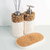 Kit Lavabo Duna com dispenser e difusor, decorado com pedras naturais e base de cortiça.