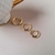 Brinco Cloe M Dourado na internet