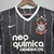 Camisa retrô preta do Corinthians, modelo 11/12, com detalhes em branco e escudo do time.