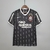 Camisa retrô preta do Corinthians, modelo Away 11/12, com detalhes em branco e logotipo da Nike.