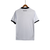 Camisa branca do Botafogo para torcedores masculinos, com detalhes em preto e logo da marca Reebok.