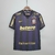 Camisa retrô do Corinthians, modelo 09/10, nas cores preta e roxa, com detalhes em amarelo e logo da Nike.