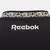 Detalhe da parte de trás da camisa Botafogo II 24/25, mostrando o logo da Reebok e o design do colarinho.