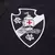 Emblema da camisa Vasco III 24/25 Kombat Jogador Kappa Masculina, destacando o navio e a cruz vermelha sobre um fundo preto.